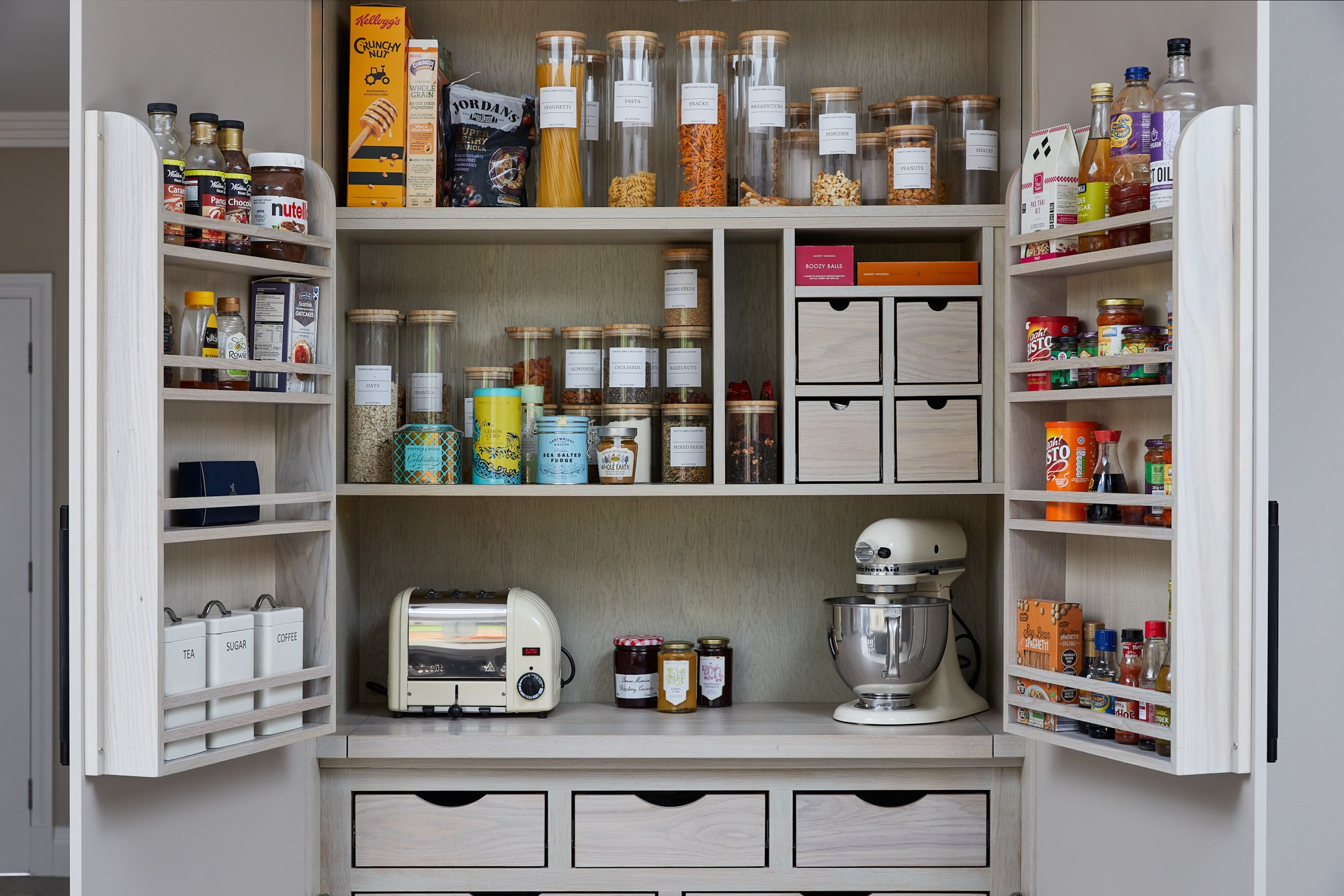 Fitted pantry with shelves, spice racks and dedicated small-appliance storage